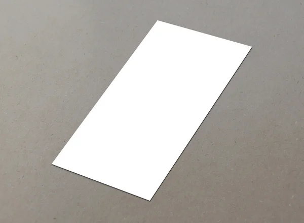 Blank white paper (4"x 8") flyer on floor — Stock Photo, Image