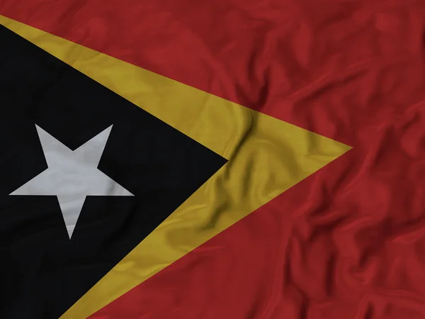 Closeup nabíranou Východního Timoru vlajka — Stock fotografie