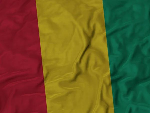 Closeup nabíranou Guinea vlajky — Stock fotografie