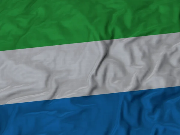 Primer plano de la bandera de Sierra Leona con volantes — Foto de Stock