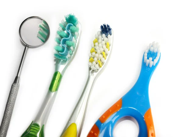 Cepillo de dientes y espejo — Foto de Stock