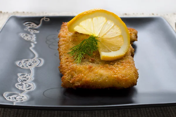 Christmas, fried carp with lemon — Stock Photo, Image