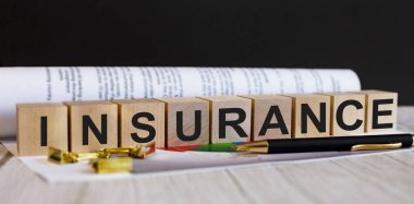 INSURANCE kelimesi kalem ve belgenin yanındaki tahta küplere yazılmıştır..