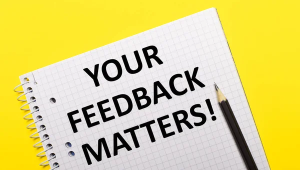 White Notebook Inscription Your Feedback Matters Written Black Pencil Bright — Stock Photo, Image