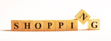 Hafif bir arka planda, metin alışverişi yapan tahta küpler