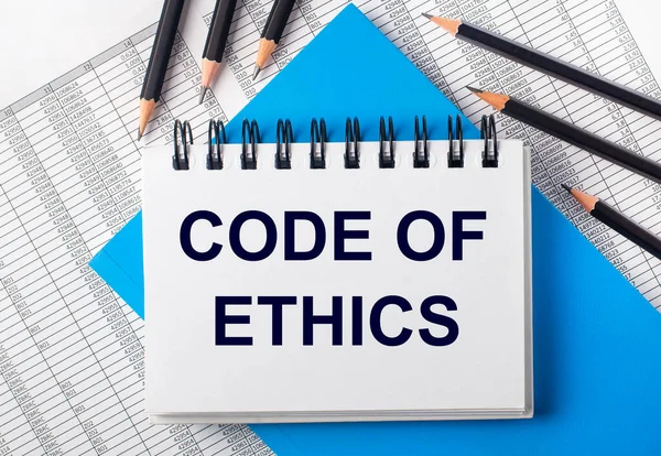 White Notebook Text Code Ethics Table Next Black Pencils Blue — Stock Photo, Image