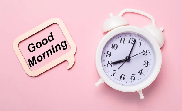 Delicate Pink Background White Alarm Clock Wooden Frame Text Good — Stock Fotó