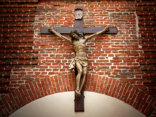 Crucifixion of Christ on a stone wall — Stock Photo, Image