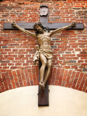 İsa çarmıha germe bir tuğla duvar