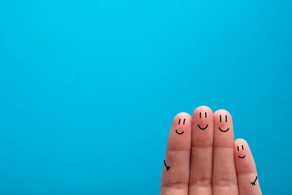 Four smiling fingers that are very happy to be friends — 图库照片