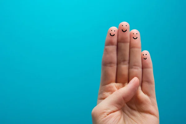 Cuatro dedos sonrientes que están muy contentos de ser amigos — Foto de Stock