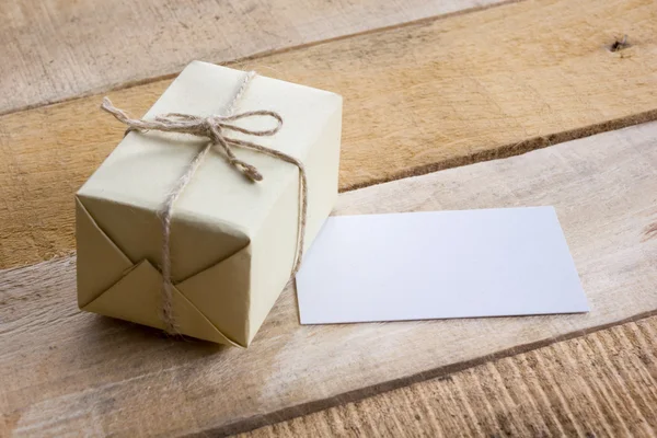 White blank business visit card, gift, ticket, pass, on wooden table. Copt Space for text — Stock Photo, Image