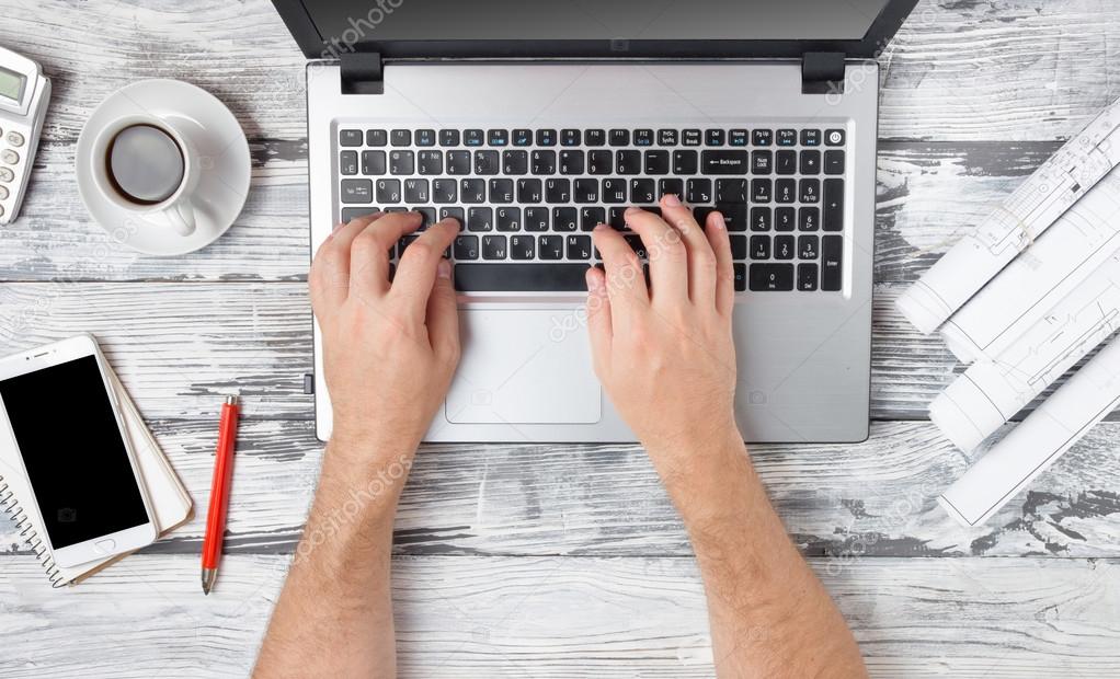 Mans hands typing laptop keyboard making online payment at home against the wooden table. On-line shopping concept. Selective focus, computer pc — Stock Fotó © Vim #119509038