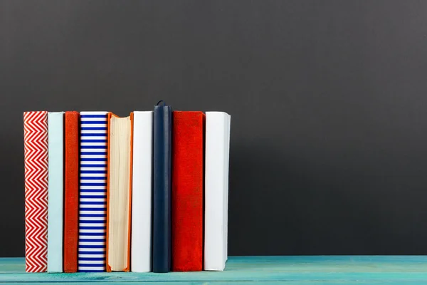 Composition with old vintage colorful hardback books, diary on w — Stock Photo, Image