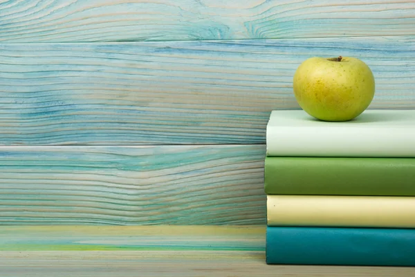 Back to school. Stack of colorful books on wooden table. — Stock Photo, Image