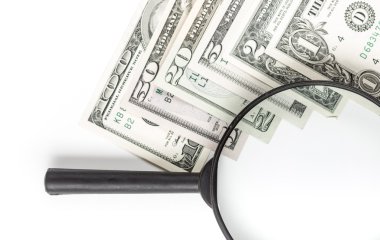 Money American dollars background with magnifying glass. Copy space. Banking. Go to Bank. Growth