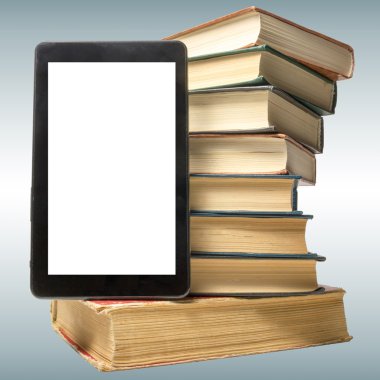 Books and electronic book reader. Electronic library concept. Co