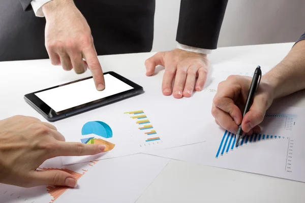 Business people on a meeting analyzing financial reports — Stock Photo, Image