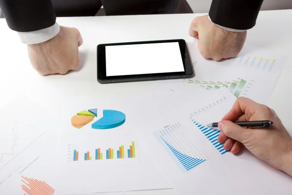 Business people on a meeting analyzing financial reports discuss — Stock Photo, Image