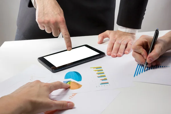 Business people on a meeting analyzing financial reports discuss — Stock Photo, Image