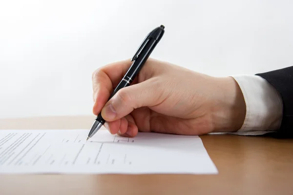 Hands signing business documents. Signing papers. Lawyer Stock Image