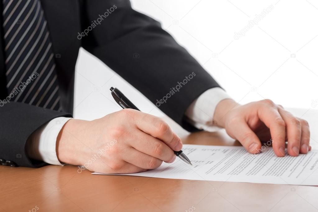 Hands signing business documents. Signing papers. Lawyer