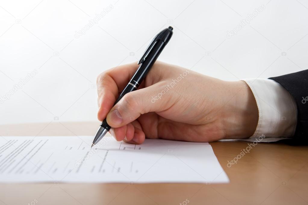 Hands signing business documents. Signing papers. Lawyer