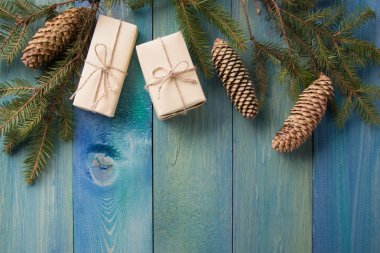 Christmas rustic background - vintage planked wood with Christmas fir tree and free text space. Winter holidays concept. Copy space for your text. Merry Christmas and happy new year!