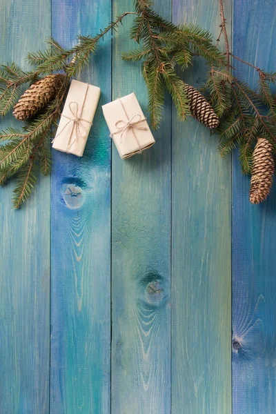 Christmas rustic background - vintage planked wood with Christmas fir tree and free text space. Winter holidays concept. Copy space for your text. Merry Christmas and happy new year!