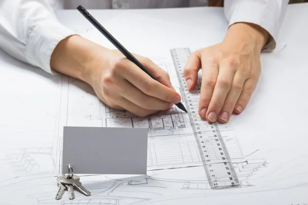 Architect working on blueprint. Architects workplace - architectural project, blueprints, ruler, calculator. Construction REAL ESTATE concept. Engineering tools. Top view. — ストック写真