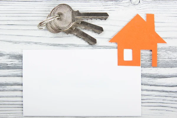 Real Estate Concept Paper model house against wooden background. Ecological building. Top view. — Stock Photo, Image