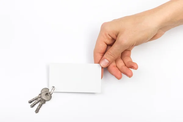 Руки, що тримають білу порожню візитну картку, подарунок, квиток, прохід, подарунок — стокове фото