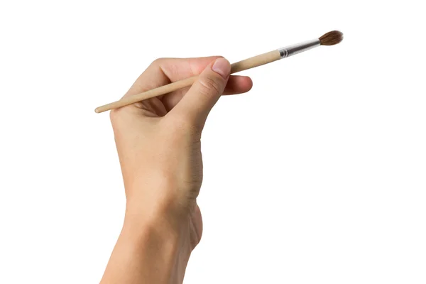 Mão feminina com escova isolada sobre fundo branco — Fotografia de Stock