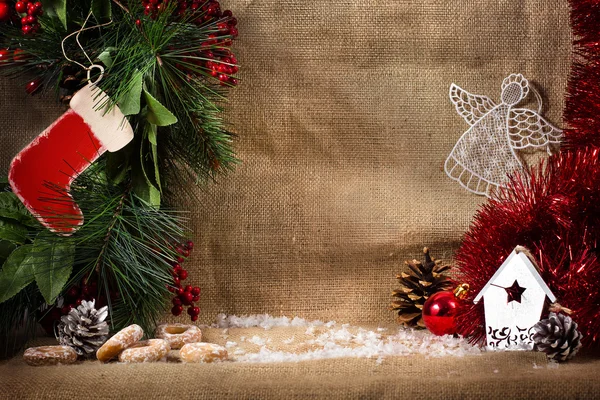 Świąteczne dekoracje na streszczenie, vintage filtr, nieostrość świątecznych dekoracji wokół białe transparent na worki — Zdjęcie stockowe