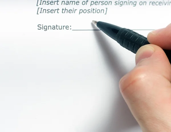 Businessmans hand signing papers. Lawyer, realtor, businessman