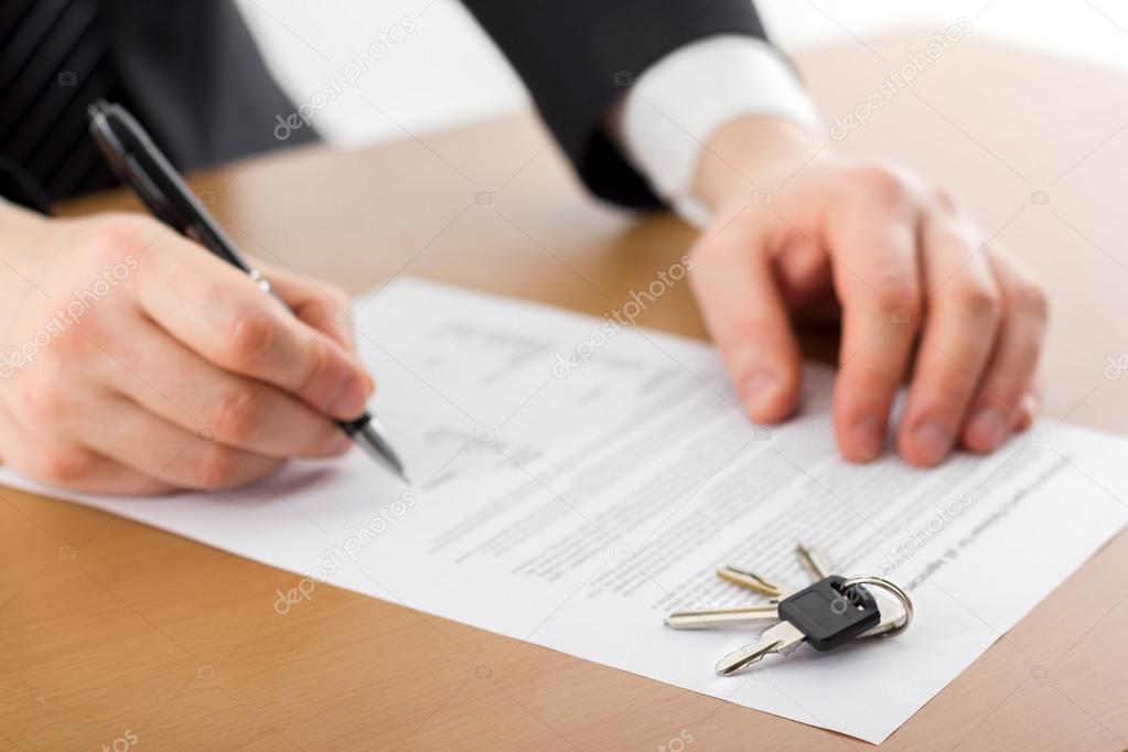 Hands signing business documents. Signing papers. Lawyer, realto