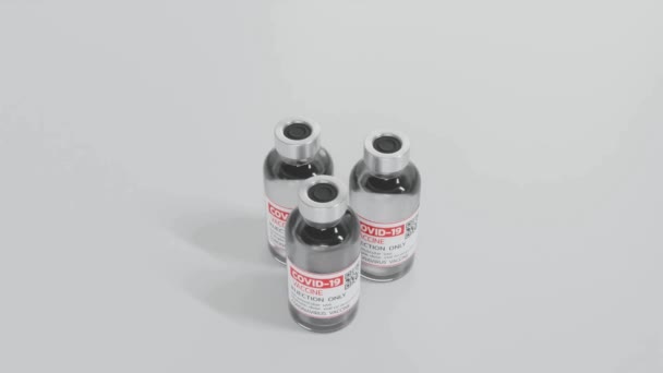 Coronavirus COVID-19 frasco de inyección de vacuna 3D render illustration — Vídeo de stock