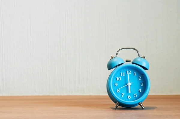 Close up of alarm clock on wooden table. — Stock Photo, Image