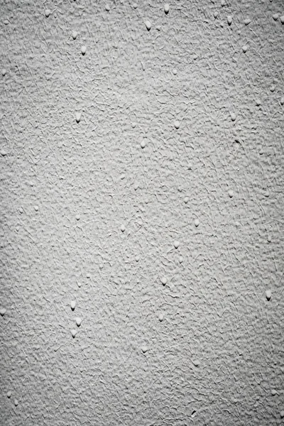 White sand textured wall.