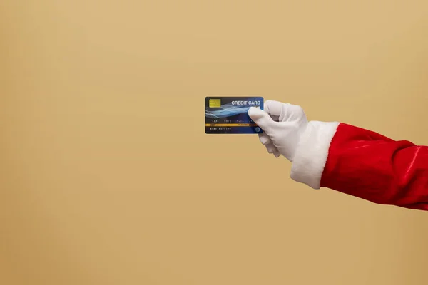 Santa Claus Mano Sosteniendo Tarjeta Crédito Plástico Azul Sobre Fondo —  Fotos de Stock