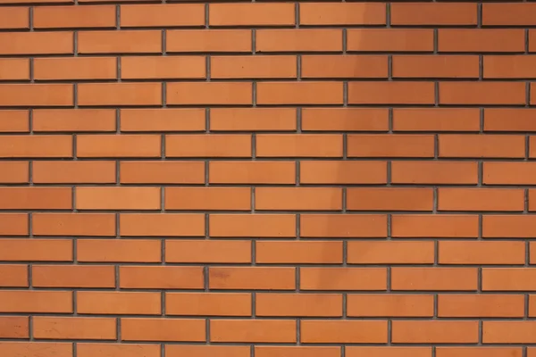 Brick wall textur bakgrund. Orange tegelstenar grunge mönster. — Stockfoto