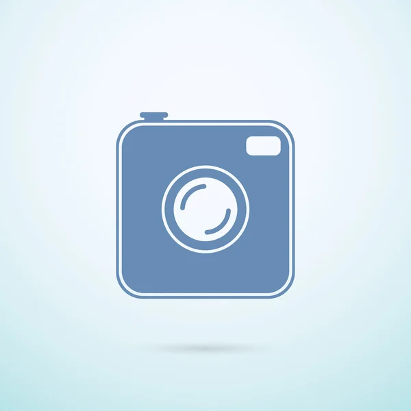 Old photocamera flat icon on blue background — Stock Vector