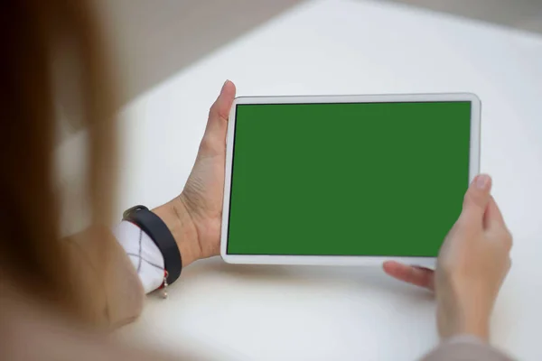 Green Screen and Chroma Key of Tablet Computer. Business Man Holding Mobile PC and Working Closeup. Office Worker Searching Content at Web Blog Vertical Video. smm specialist at work