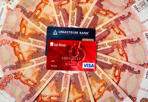 Plastic cards are on Russian money — Stock Photo, Image