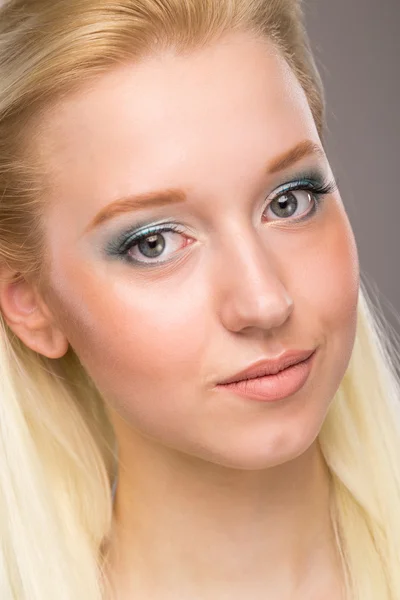Girl with make-up on her face Royalty Free Stock Images