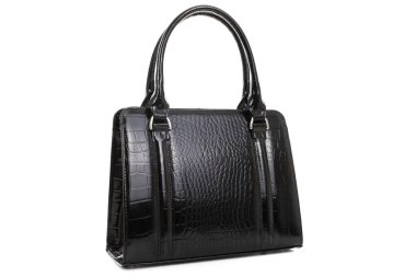 Hakiki deriden yapılmış el çantası beyaz arka plana yakın.