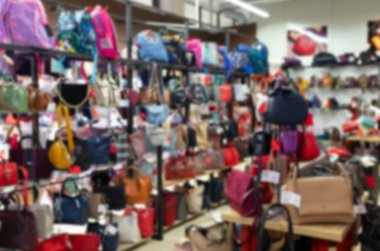 department store with a large assortment of clothes, blurred and defocused