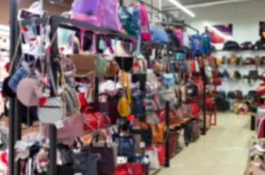 department store with a large assortment of clothes, blurred and defocused
