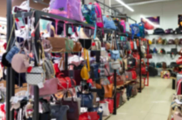 department store with a large assortment of clothes, blurred and defocused