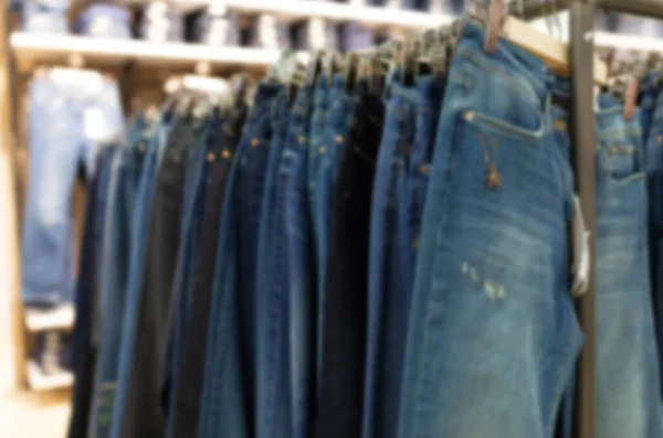 Pants store of different colors and sizes, blurred and defocused — Foto Stock